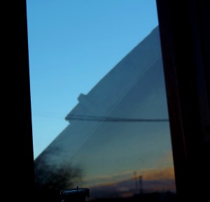  refected dawn on window